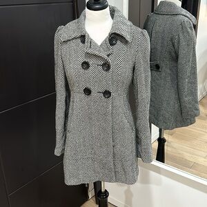 Guess. Small. Black and white.